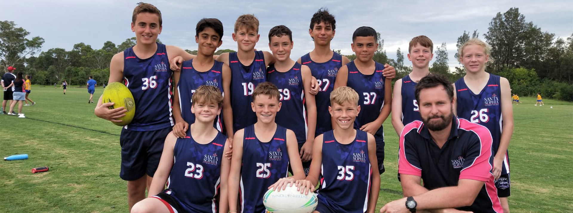 Santa Sophia Catholic College Box Hill students playing oztag