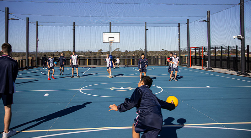 Santa Sophia Catholic College Box Hill students playing on the basketball court