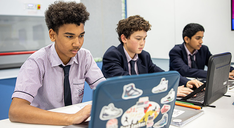 Santa Sophia Catholic College Box Hill students using laptops