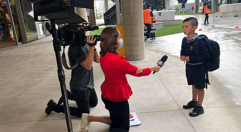 Santa Sophia Catholic College Box Hill student talking to television crew