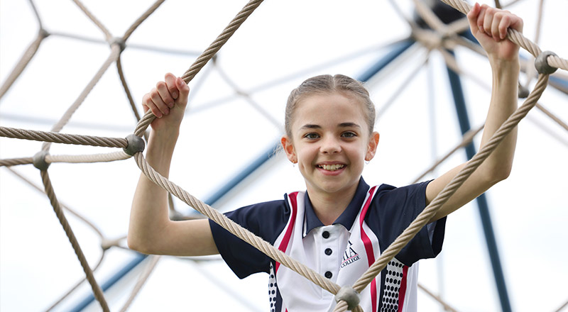 Santa Sophia Catholic College Box Hill student in webbing structure