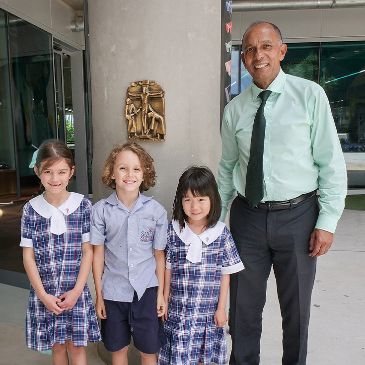 Santa Sophia Catholic College Box Hills dedicated principal Mark De Vries and students of various ages