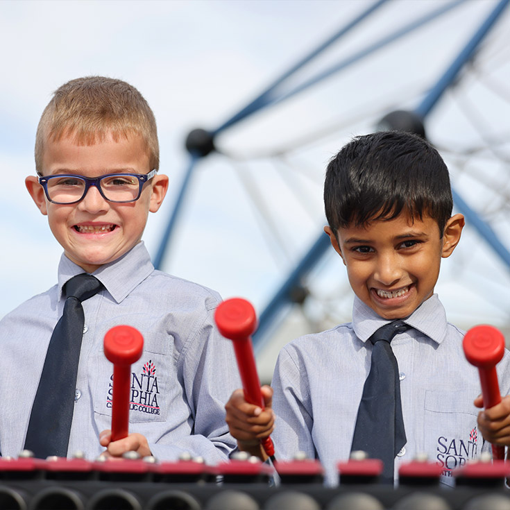 Santa Sophia Catholic College Box Hill students playing xylophone