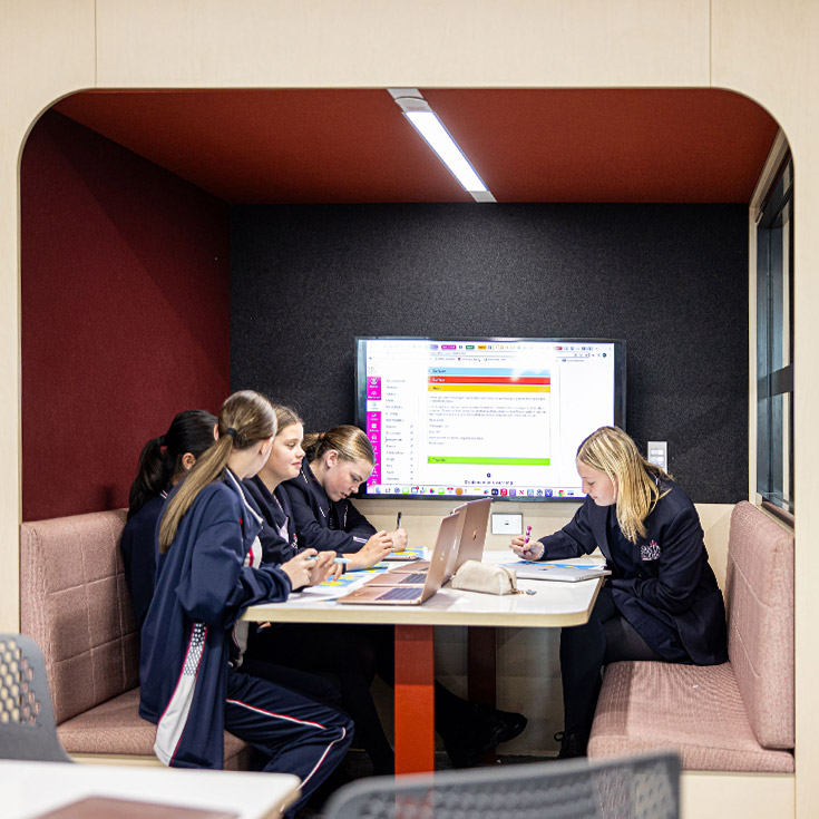 Santa Sophia Catholic College Box Hill students learning in booth