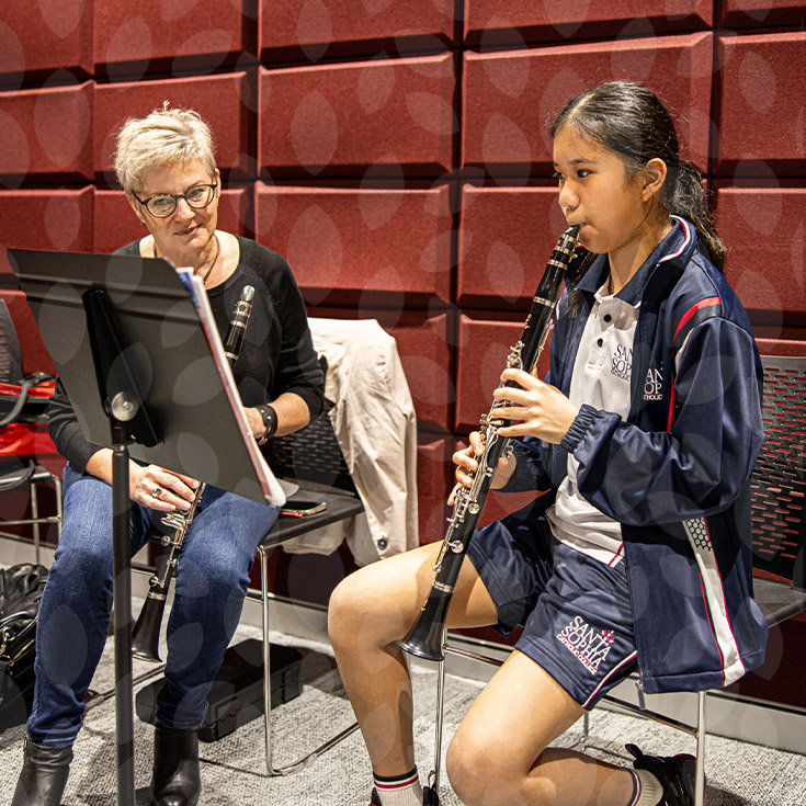 Santa Sophia Catholic College Box Hill student learning clarinet with dedicated teacher