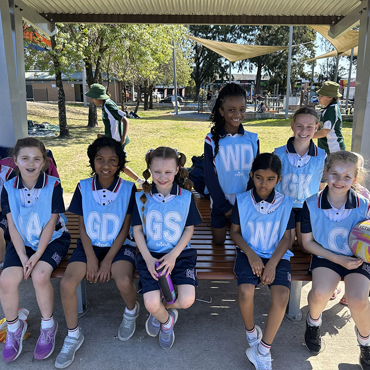 Santa Sophia Catholic College Box Hill students playing netball