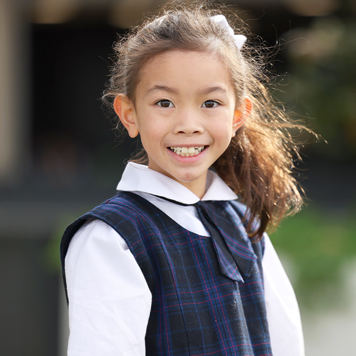Santa Sophia Catholic College Box Hill student wearing winter uniform