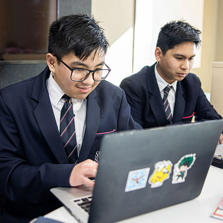 Santa Sophia Catholic College Box Hill students on laptop