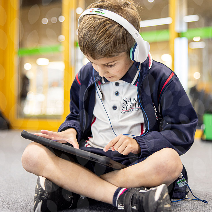Santa Sophia Catholic College Box Hill student wearing headphones