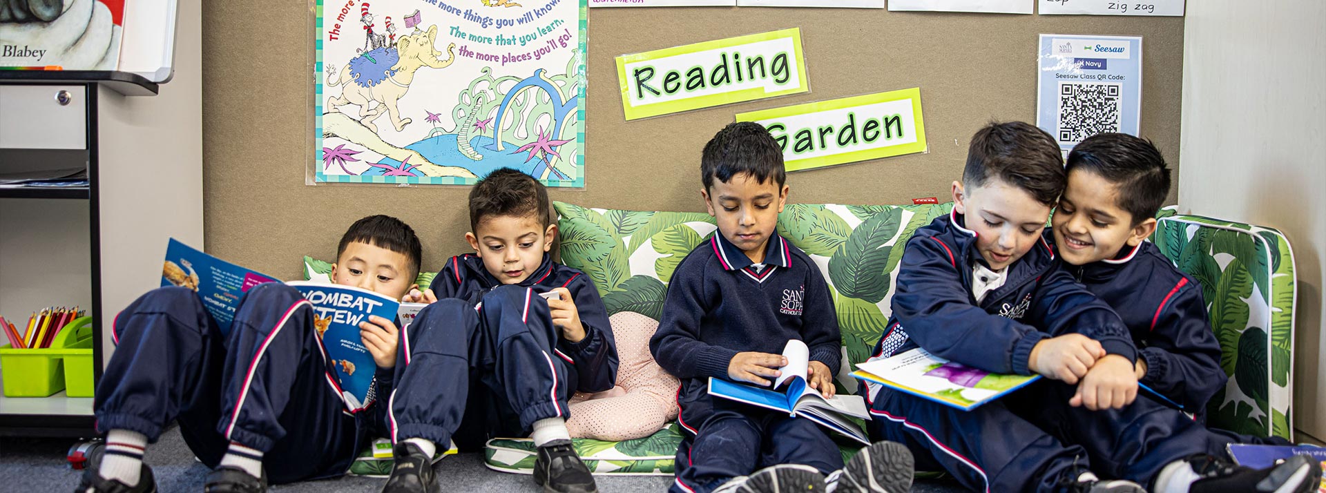 Santa Sophia Catholic College students sitting in Reading Garden