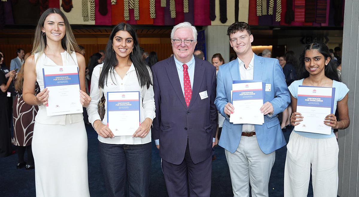 Chief Executive Officer Jack de Groot with CSPD’s four First in Course students